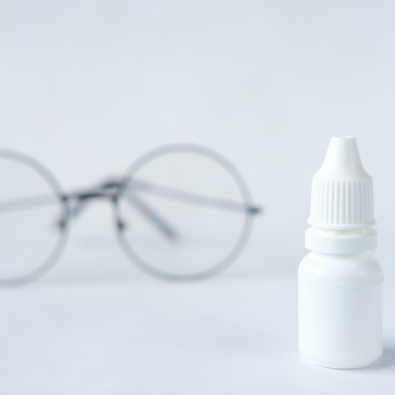 white plastic bottle with white cap